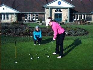Hannah-and-coach-winter-practice.jpg